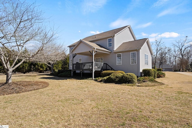 exterior space featuring a deck and a yard