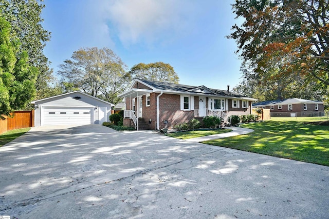 single story home featuring an outbuilding, a garage, brick siding, fence, and a front lawn