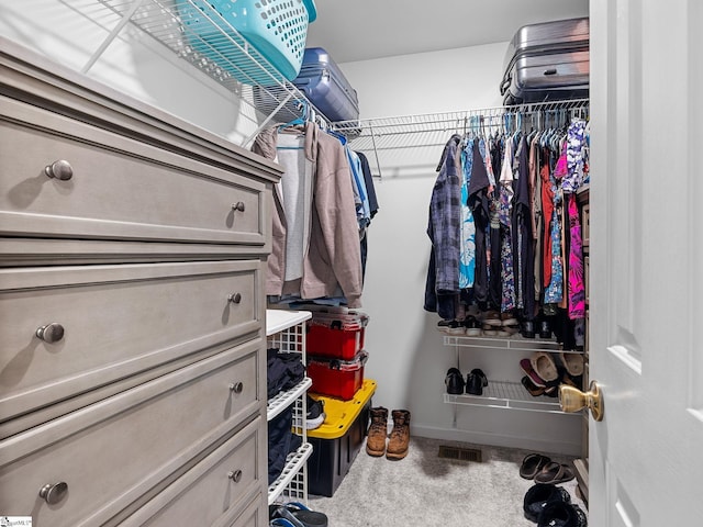 spacious closet featuring carpet floors and visible vents