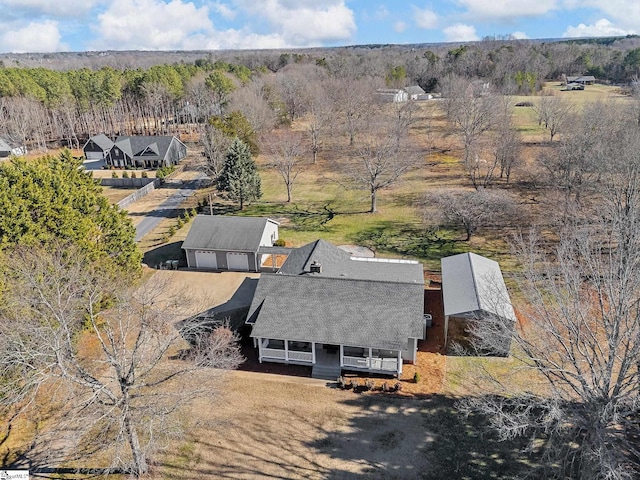 bird's eye view with a view of trees