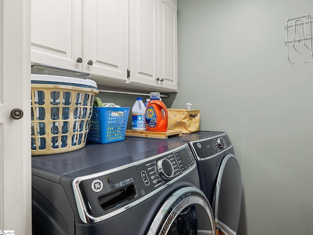 laundry area featuring cabinet space and independent washer and dryer