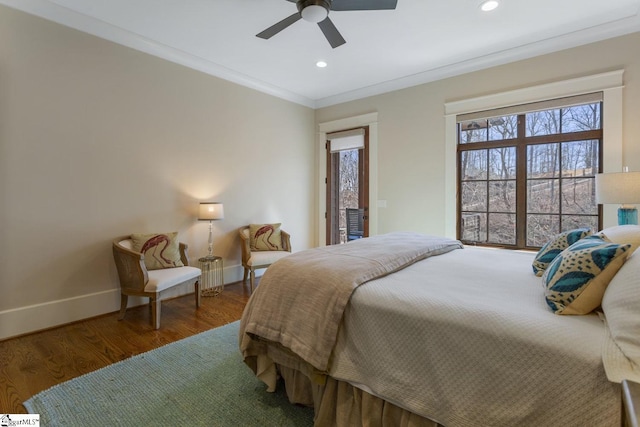 bedroom with baseboards, ornamental molding, wood finished floors, and recessed lighting