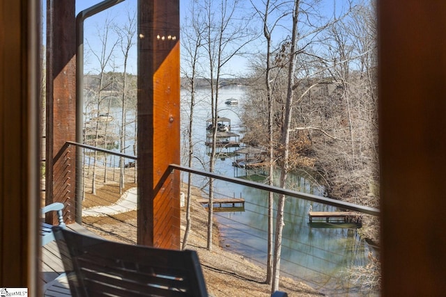 balcony featuring a water view