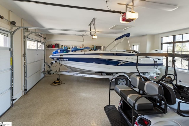 garage featuring a garage door opener