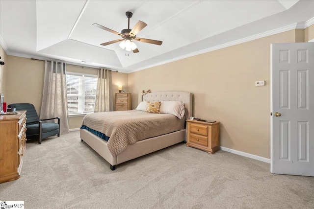 bedroom featuring baseboards, a tray ceiling, carpet flooring, and ornamental molding