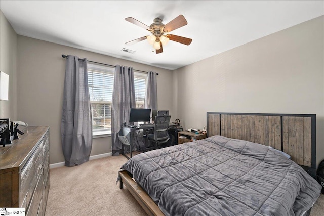 bedroom with visible vents, baseboards, a ceiling fan, and light colored carpet