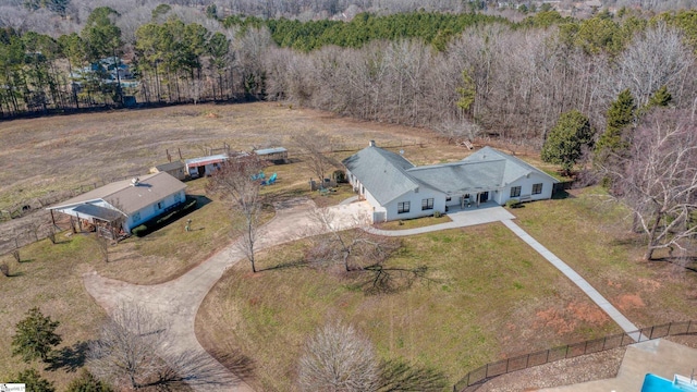 aerial view featuring a view of trees