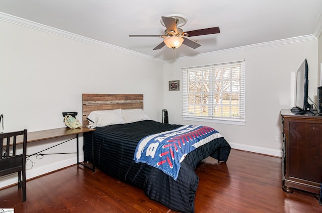 bedroom featuring baseboards, ornamental molding, and wood finished floors