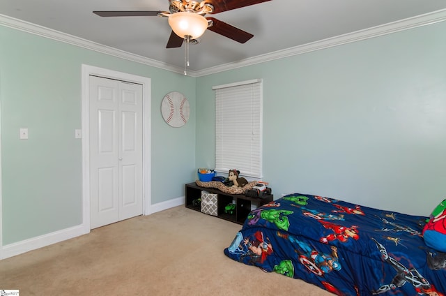 bedroom featuring baseboards, ornamental molding, ceiling fan, and carpet flooring