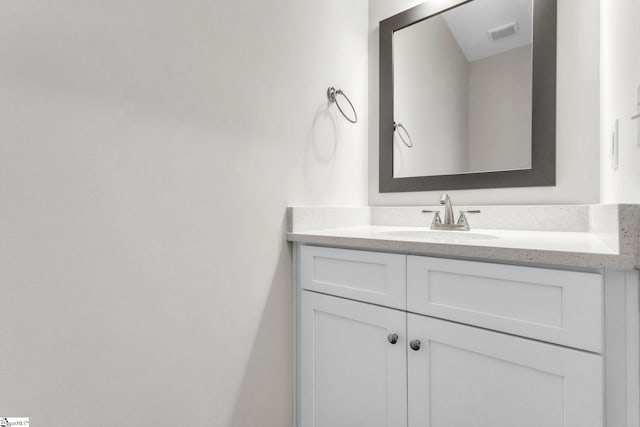 bathroom with visible vents and vanity