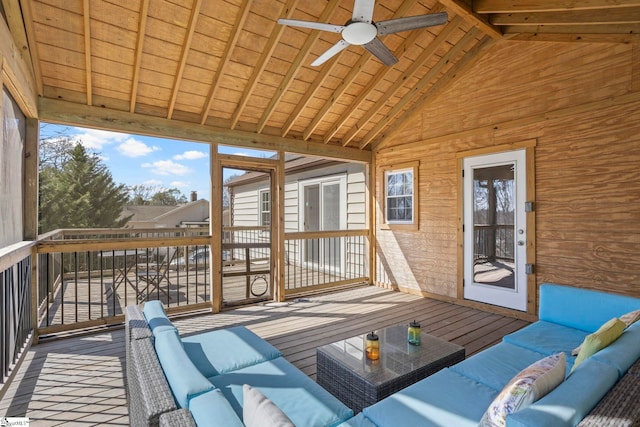 unfurnished sunroom with vaulted ceiling with beams, ceiling fan, and wood ceiling