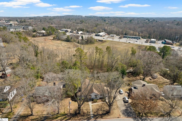 aerial view featuring a forest view