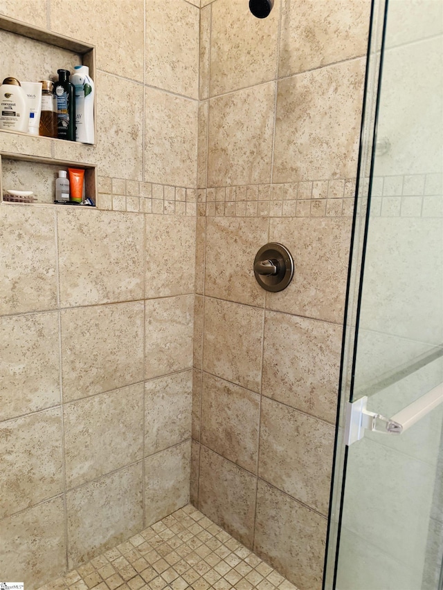 bathroom with a stall shower