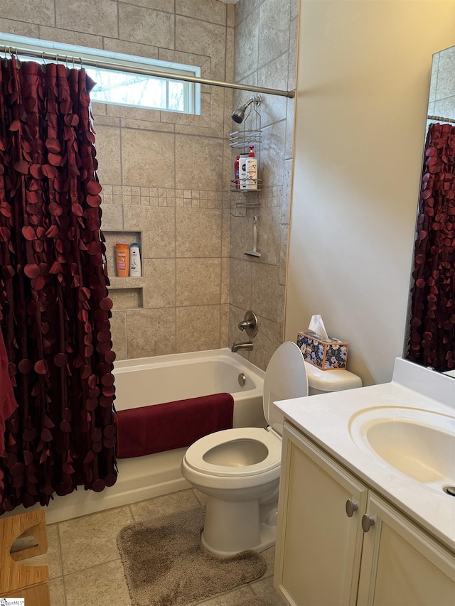 bathroom with toilet, shower / tub combo, and vanity