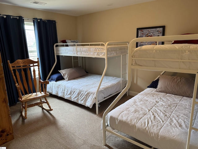 carpeted bedroom with visible vents