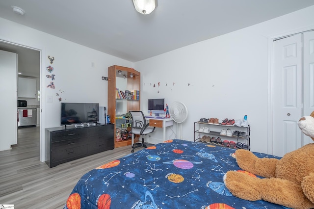 bedroom with wood finished floors