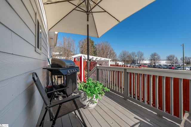 wooden deck with area for grilling