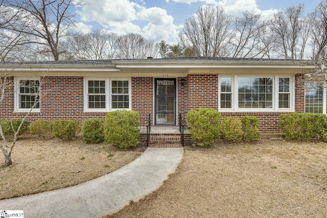 view of front of property with brick siding