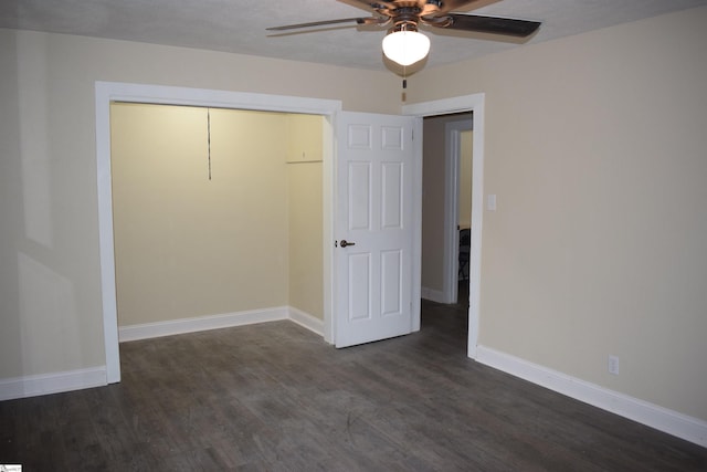 unfurnished bedroom featuring ceiling fan, baseboards, and wood finished floors