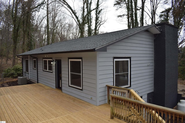 wooden deck with central AC unit