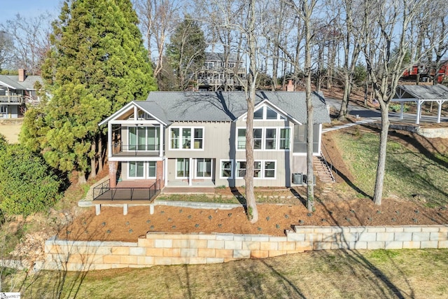 back of property with a patio area