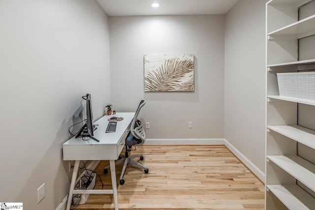 office with baseboards, wood finished floors, and recessed lighting