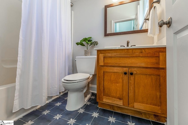 full bathroom with shower / bath combination with curtain, vanity, toilet, and tile patterned floors