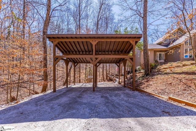 exterior space featuring a carport