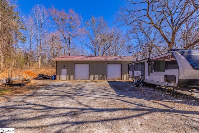 view of front of home with an outdoor structure