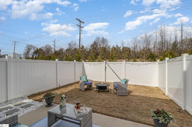 107 Tramore Ln, Fountain Inn, SC 29644 - view of yard with a fenced backyard, an outdoor fire pit, a gate, and a patio area