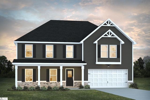 view of front facade featuring a garage, concrete driveway, covered porch, and brick siding