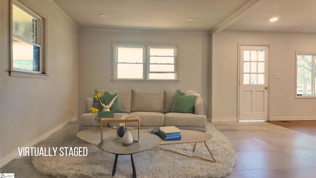 living room with baseboards, recessed lighting, and crown molding