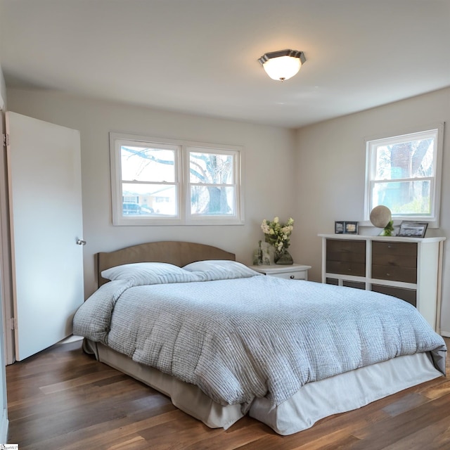 bedroom featuring wood finished floors