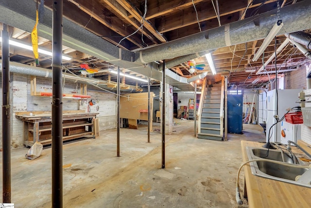 unfinished basement featuring heating unit