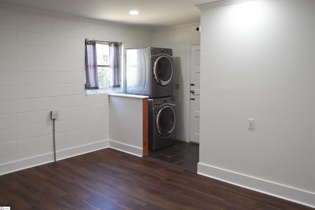 612 W Main St, Easley, SC 29640 - washroom featuring laundry area, baseboards, ornamental molding, stacked washing maching and dryer, and dark wood finished floors