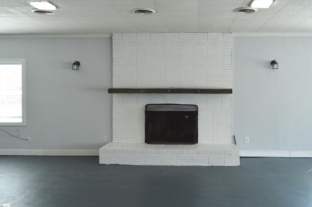 612 W Main St, Easley, SC 29640 - details featuring concrete flooring, a fireplace, visible vents, baseboards, and crown molding