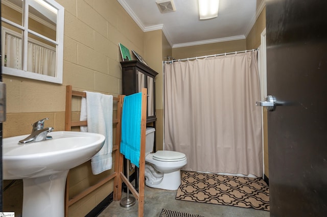 full bathroom featuring concrete block wall, visible vents, toilet, ornamental molding, and concrete flooring