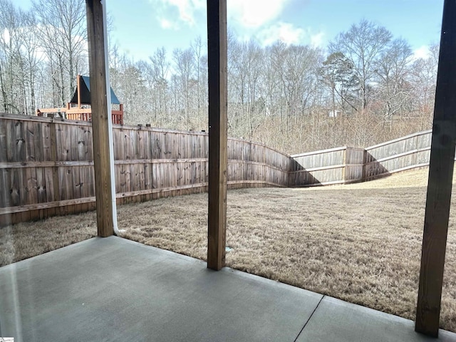 view of yard featuring a patio area and a fenced backyard