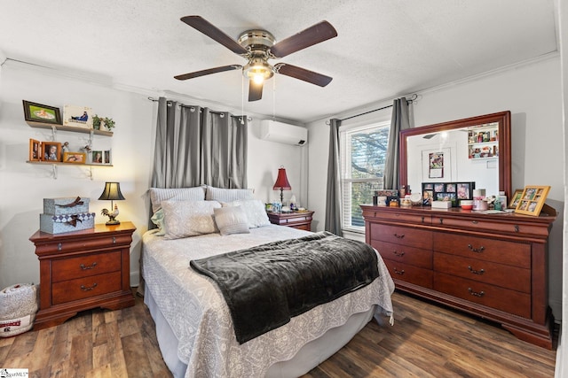 bedroom featuring a ceiling fan, dark wood-style flooring, a textured ceiling, and a wall mounted AC