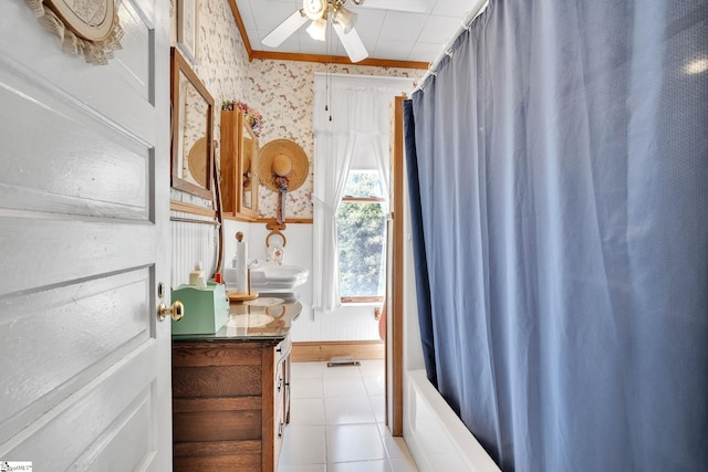 full bath with tile patterned flooring, ceiling fan, vanity, and wallpapered walls