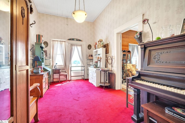 misc room with carpet flooring and wallpapered walls