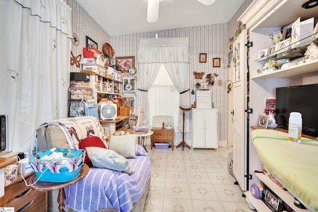 interior space with wallpapered walls and light floors