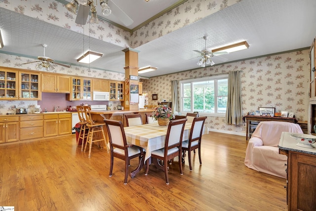 dining area featuring wallpapered walls, baseboards, a ceiling fan, ornamental molding, and light wood-type flooring