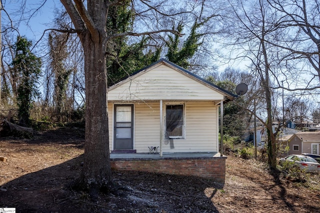 exterior space featuring covered porch