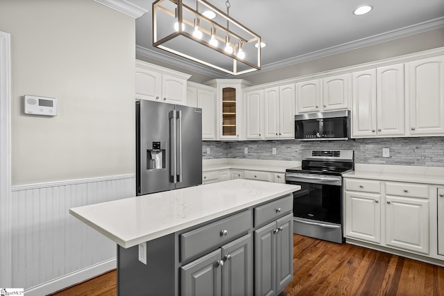 kitchen featuring white cabinetry, appliances with stainless steel finishes, and gray cabinets