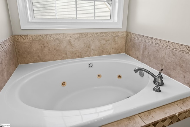 bathroom featuring a whirlpool tub