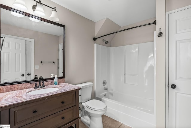 full bath with toilet, vanity, washtub / shower combination, and tile patterned floors