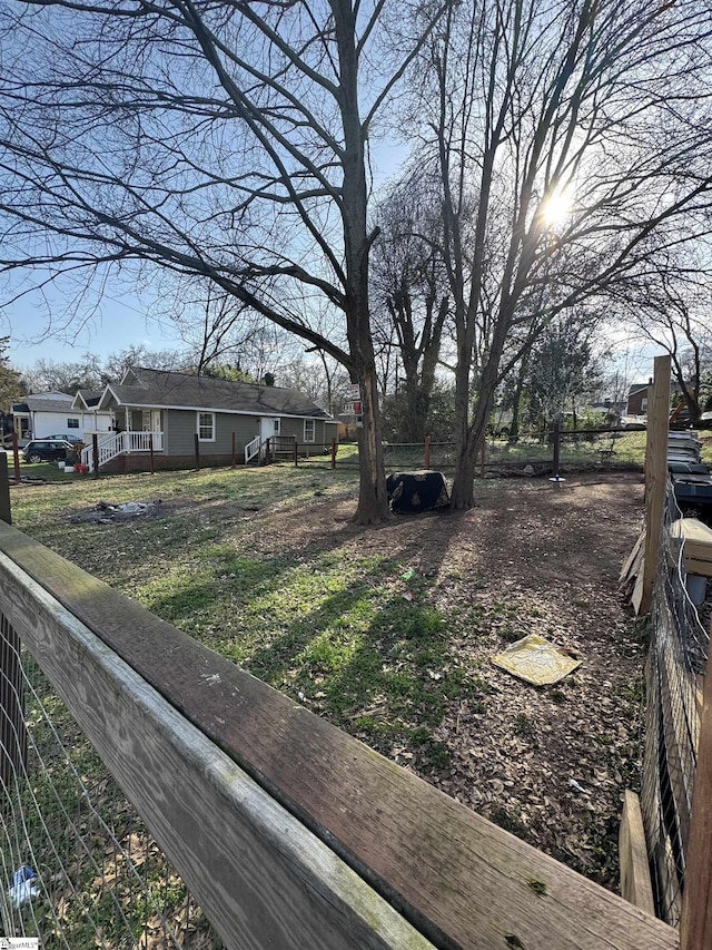 view of yard with fence