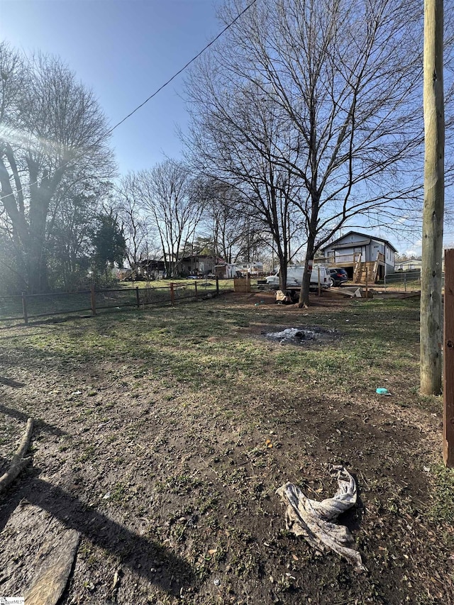 view of yard with fence