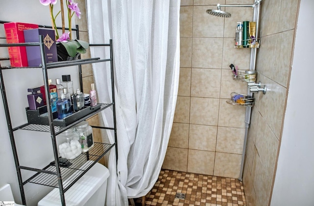 bathroom with a shower stall